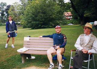 104 2t1. CHS XC Adam on the bench next to Mr. Trautwein