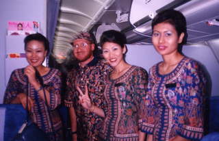 Singapore Airlines Adam and hostesses