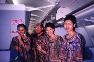 Adam and Singapore Air flight attendentsAdam and Singapore Air flight attendents