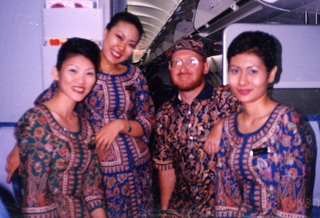 Adam and Singapore Air flight attendents