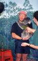 Cleland Park, Adam holding Koala bear with exhibitor