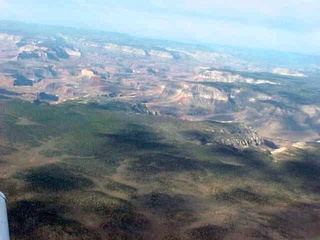 124 54m. North Rim of the Grand Canyon with cloud shadows 1 -- aerial