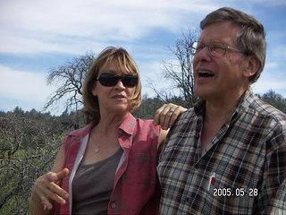 5 5fu. Linda and Loren Lee amid burnt trees