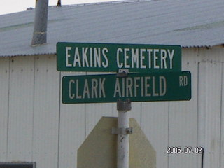 Eakins Cemetary and Clark Airfield Road sign