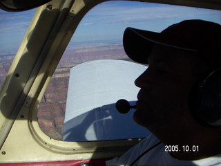 Tim Higel in silhouette over my wing over the Grand Canyon