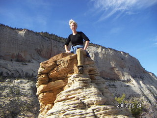 Zion National Park -- Angel's Landing hike -- woman climbing the rocks