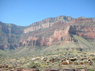 Plateau Point -- Mighty Colorado River -- Adam on rock ledge