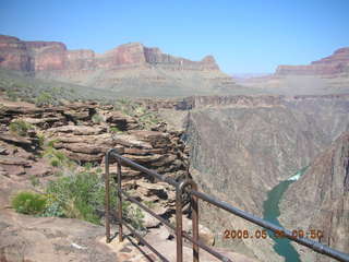 Plateau Point -- Mighty Colorado River -- Adam on rock ledge