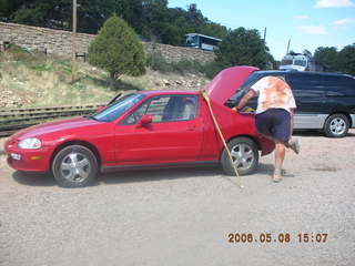 Greg packing his red Honda