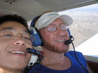 Te and Adam (eyes shut blinking) flying in N4372J