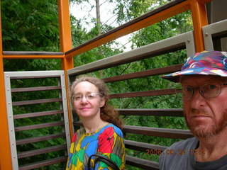 336 5xq. Morris Arboretum -- Betsy and Adam in tree-viewing sculpture