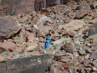 Canyonlands -- Lathrop Trail -- Adam hiking uphill