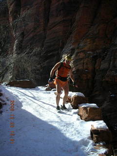 Zion National Park -- Adam slip-sliding down Walter's Wiggles