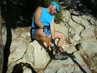 441 61t. Zion National Park - Observation Point hike - Adam putting on crampons