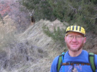 484 61u. Zion National Park - Adam with mule deer in the background - Watchman hike