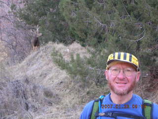 Zion National Park - Adam with mule deer in the background - Watchman hike