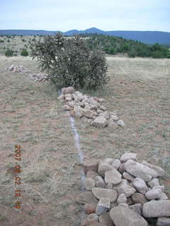 Young -- Chapman Ranch Airport - wind sock circle in rocks