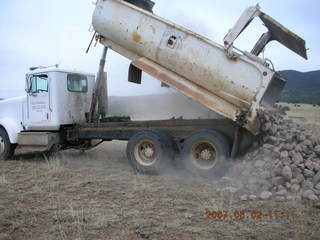 Young -- Chapman Ranch Airport - dump truck in the hangar