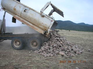 Young -- Chapman Ranch Airport - dump truck dumping rocks