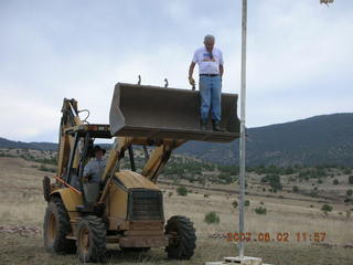 Young -- Chapman Ranch Airport - dump truck dumping rocks for wind sock circle