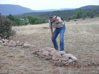 Young -- Chapman Ranch Airport - Bob working on wind sock circle