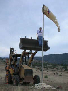 Young -- Chapman Ranch Airport - Arv on loader working on wind sock