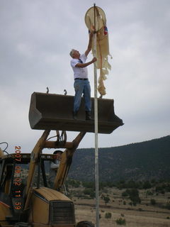 Young -- Chapman Ranch Airport - Arv on loader working on wind sock