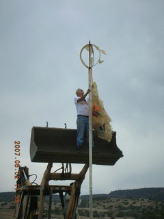 Young -- Chapman Ranch Airport - Arv on loader working on wind sock