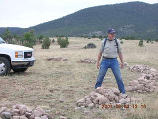 Young -- Chapman Ranch Airport - Arv on loader working on wind sock