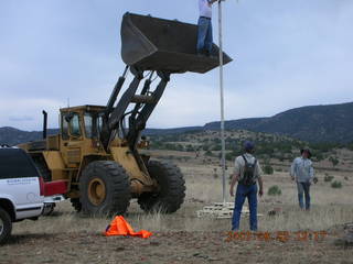 Young -- Chapman Ranch Airport - Arv on loader working on wind sock