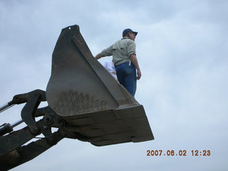 Young -- Chapman Ranch Airport - Arv and Bob on loader working on wind sock