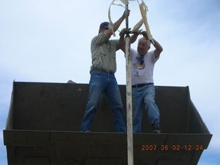 Young -- Chapman Ranch Airport - Arv on loader working on wind sock