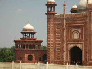 Taj Mahal patterened walkway wall, entrance in distance