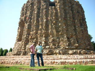 Qutub Minar, Delhi - big tower seen in broken arch