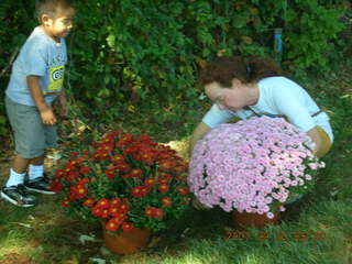 Gloria's unveiling - Gaby and Betsy setting up flowers