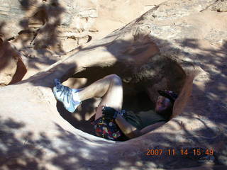 685 6be. Arches National Park - Devils Garden hike - Adam in hole in rock