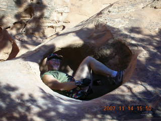 Arches National Park - Devils Garden hike - Adam in hole in rock