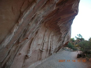 Arches National Park - Devils Garden hike - Adam in hole in rock