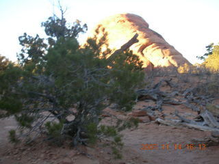 Arches National Park - Devils Garden hike - Adam in hole in rock