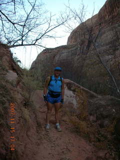 Arches National Park - Devils Garden hike - Adam in hole in rock