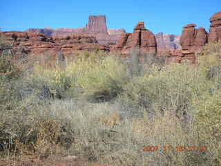 Canyonlands National Park - Lathrop Trail hike - Adam (tripod) running