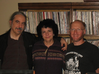 John Dudley photo - Bill, Kate, Adam in front of my records