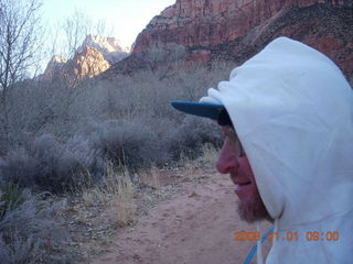 Zion National Park - sunrise Angels Landing hike - Adam climbing down chains