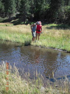 Dustin carrying Adam across river - hiking at Pine Valley, Utah