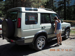 Dustin carrrying Adam across river - hiking at Pine Valley, Utah