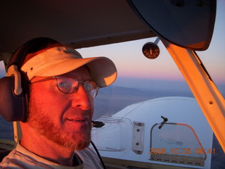 Adam flying N4372J at sunrise