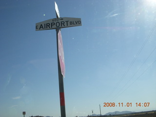 16 6p1. Airport Road sign