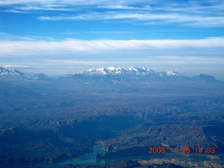 207 6pu. aerial Lake Powell distant mountains and clouds