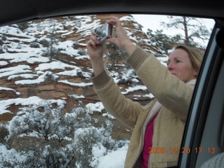 Zion National Park- Debbie taking a picture seen from the car