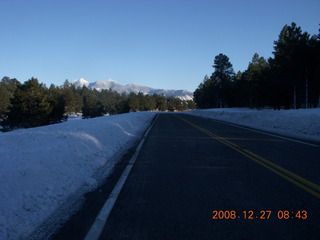 cold snowy road near Flagstaff Airport (FLG)